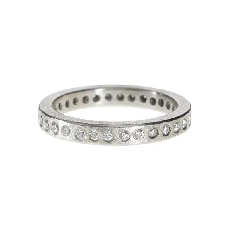 Palladium and Gypsy Set Diamond Ring